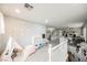 A versatile upstairs landing/play area with gray wood laminate flooring at 8890 Bonneville Peak Ct, Las Vegas, NV 89148