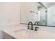 Modern bathroom vanity with white countertop, black faucet fixtures, and minimalist design at 8979 Rolling Pietra St, Las Vegas, NV 89166