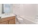 Bathroom featuring a modern vanity, toilet, and shower with white tile and a glass enclosure at 8979 Rolling Pietra St, Las Vegas, NV 89166