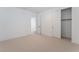 Well-lit bedroom featuring a closet and contemporary doors for a spacious, modern design at 8979 Rolling Pietra St, Las Vegas, NV 89166