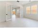 Bright office space features white tile flooring, glass paneled french doors, and natural light from two windows at 8979 Rolling Pietra St, Las Vegas, NV 89166