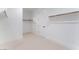 Spacious walk-in closet featuring ample shelving and neutral carpeting for organized storage at 8979 Rolling Pietra St, Las Vegas, NV 89166