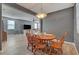 Dining room adjacent to the living room with wood floors at 9180 Wine Cellar Ave, Las Vegas, NV 89148