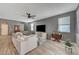 Spacious living room with wood floors and neutral décor at 9180 Wine Cellar Ave, Las Vegas, NV 89148