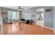 Cozy living room showcasing wood floors, natural light, and comfortable seating at 9180 Wine Cellar Ave, Las Vegas, NV 89148