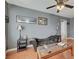 Comfortable living room with a plush chaise lounge and stylish decor at 9180 Wine Cellar Ave, Las Vegas, NV 89148
