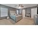 Inviting main bedroom with plush carpet, abundant natural light, and elegant furnishings at 9180 Wine Cellar Ave, Las Vegas, NV 89148