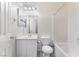 Bright bathroom featuring a vanity, toilet, and tub/shower combination at 9303 Gilcrease Ave # 1013, Las Vegas, NV 89149