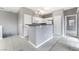Well-lit kitchen featuring white cabinets and modern lighting fixtures at 9303 Gilcrease Ave # 1013, Las Vegas, NV 89149