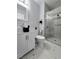 Modern bathroom featuring a glass shower, modern vanity, and decorative accents at 1021 Wengert Ave, Las Vegas, NV 89104
