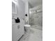 Modern bathroom featuring a glass shower and a sleek white vanity at 1021 Wengert Ave, Las Vegas, NV 89104