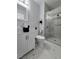 Stylish bathroom with a glass shower, modern vanity, and decorative accents at 1021 Wengert Ave, Las Vegas, NV 89104