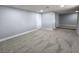 Spacious room featuring neutral carpet, baseboard trim, and recessed lighting at 1021 Wengert Ave, Las Vegas, NV 89104