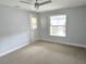 Cozy bedroom featuring a window and door to the backyard at 1021 Wengert Ave, Las Vegas, NV 89104