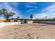 Spacious backyard offering plenty of room for outdoor activities and future landscaping at 1225 Arrowhead Ave, Las Vegas, NV 89106