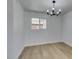 Bright dining room features new floors, modern lighting, and fresh paint, for a comfortable and modern feel at 1225 Arrowhead Ave, Las Vegas, NV 89106