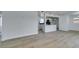 Bright and open living space featuring new floors flowing into a modern kitchen at 1225 Arrowhead Ave, Las Vegas, NV 89106