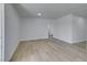 Open living space showcasing updated flooring and modern recessed lighting at 1225 Arrowhead Ave, Las Vegas, NV 89106