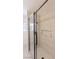 Shower featuring stylish tile and an inset storage shelf at 1624 N Torrey Pines Dr # 101, Las Vegas, NV 89108