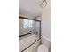 Bathroom with gray tiled walls features a shower-over-tub with black trim at 1624 N Torrey Pines Dr # 101, Las Vegas, NV 89108