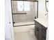 Beautiful bathroom with tiled shower, new vanity, and modern fixtures at 1624 N Torrey Pines Dr # 101, Las Vegas, NV 89108