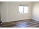 Bright bedroom with luxury vinyl plank flooring and neutral walls at 1624 N Torrey Pines Dr # 101, Las Vegas, NV 89108