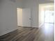Spacious living room showcasing luxury vinyl plank flooring at 1624 N Torrey Pines Dr # 101, Las Vegas, NV 89108