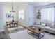 Cozy living room featuring modern furnishings and ample natural light at 1624 N Torrey Pines Dr # 101, Las Vegas, NV 89108