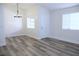 Bright living room with luxury vinyl plank flooring at 1624 N Torrey Pines Dr # 101, Las Vegas, NV 89108