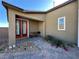 Outdoor patio area with brick pavers, desert landscaping, and cozy seating at 2040 Port Royal Dr, Laughlin, NV 89029