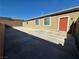Expansive backyard area with concrete patio, offering ample space for outdoor activities and relaxation at 2040 Port Royal Dr, Laughlin, NV 89029
