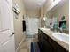 Bathroom showcasing double sinks, and a shower over tub combo, providing a functional space at 2040 Port Royal Dr, Laughlin, NV 89029