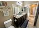 Bathroom showcasing double sinks, and a toilet, providing a functional space at 2040 Port Royal Dr, Laughlin, NV 89029