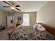Bedroom view featuring a bed, ceiling fan, and decor at 2040 Port Royal Dr, Laughlin, NV 89029