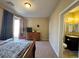 Bright bedroom with sliding door access to patio and en suite bathroom at 2040 Port Royal Dr, Laughlin, NV 89029