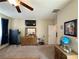 Bedroom featuring ceiling fan, carpet and fitness equipment at 2040 Port Royal Dr, Laughlin, NV 89029