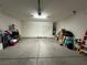 Garage featuring a white door, overhead storage, high ceilings, and interior access at 2040 Port Royal Dr, Laughlin, NV 89029
