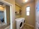 Functional laundry room with modern washer and dryer and plenty of storage space at 2040 Port Royal Dr, Laughlin, NV 89029