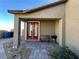 Inviting covered patio with a bench, BBQ and stylish pavers at 2040 Port Royal Dr, Laughlin, NV 89029