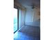 Dining area with sliding glass doors, a ceiling fan, and tiled floors at 2121 Sealion Dr # 105, Las Vegas, NV 89128