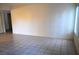 A bright and airy living room featuring tiled floors and neutral walls at 2121 Sealion Dr # 105, Las Vegas, NV 89128
