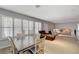 Open concept living space with wood flooring, lots of light and a connected dining area at 2240 Grayson Cir, Henderson, NV 89014