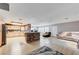 Open living space with a kitchen island, light wood cabinets, and a comfortable seating area at 2240 Grayson Cir, Henderson, NV 89014