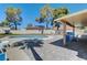 Backyard pool with a covered patio and brick pavers creating a great space for outdoor relaxation at 2240 Grayson Cir, Henderson, NV 89014