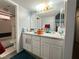 Bathroom featuring a double vanity with mirrors and a shower/tub combination at 2266 Carved Canyon Ln, Laughlin, NV 89029