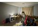 Bedroom with window coverings and exercise equipment at 2266 Carved Canyon Ln, Laughlin, NV 89029