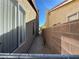 Showing side view of the property with a brick wall feature at 2266 Carved Canyon Ln, Laughlin, NV 89029