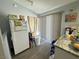 Bright kitchen with white refrigerator and ample storage space at 2266 Carved Canyon Ln, Laughlin, NV 89029