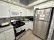 Kitchen featuring stainless steel appliances and gray countertops at 2266 Carved Canyon Ln, Laughlin, NV 89029