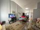 Bright, open living room featuring comfortable sofas and hardwood floors at 2266 Carved Canyon Ln, Laughlin, NV 89029